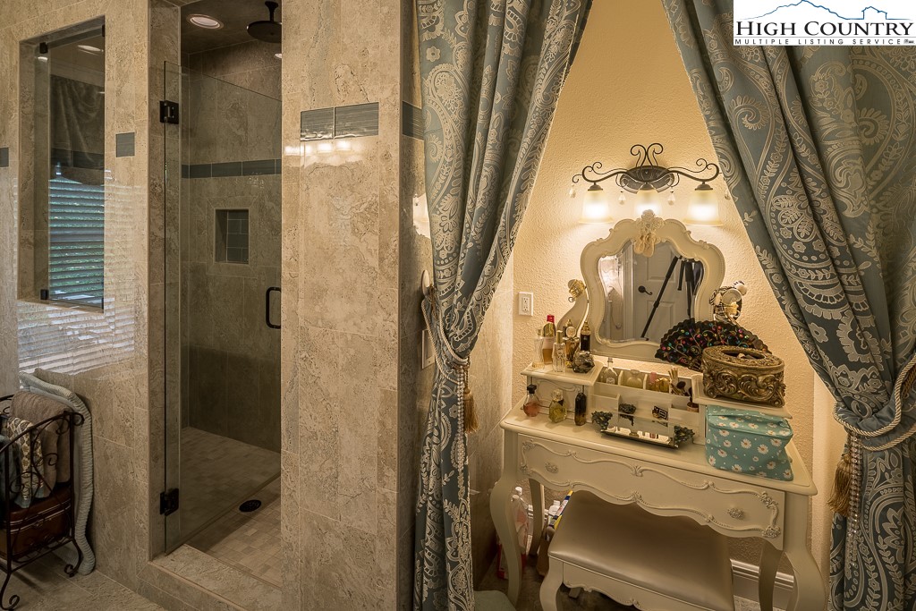 356 Upper Reach Drive Vilas, NC 28692 - Photo 16 of 49 a bathroom with a mirror