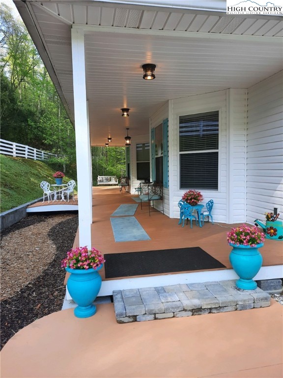 356 Upper Reach Drive Vilas, NC 28692 - Photo 34 of 49 a room with lot of potted plants