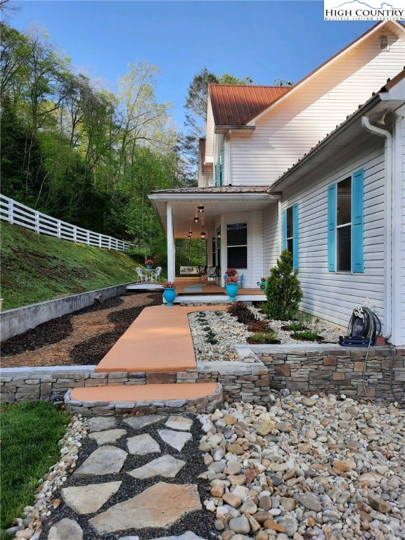 356 Upper Reach Drive Vilas, NC 28692 - Photo 35 of 49 a front view of a house with garden