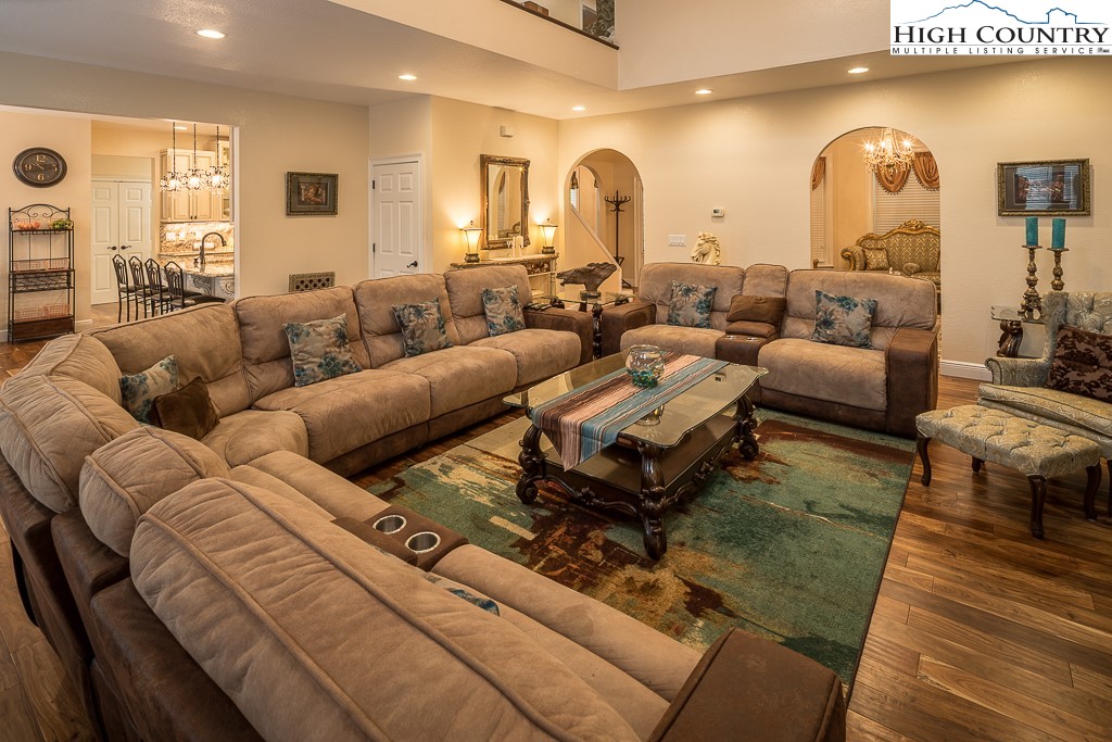 356 Upper Reach Drive Vilas, NC 28692 - Photo 4 of 49 a living room with furniture and wooden floor