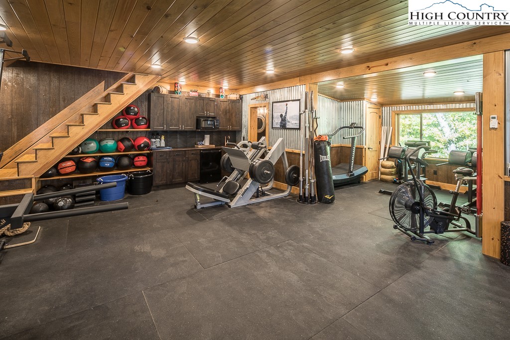 356 Upper Reach Drive Vilas, NC 28692 - Photo 45 of 49 a view of a room with gym equipment