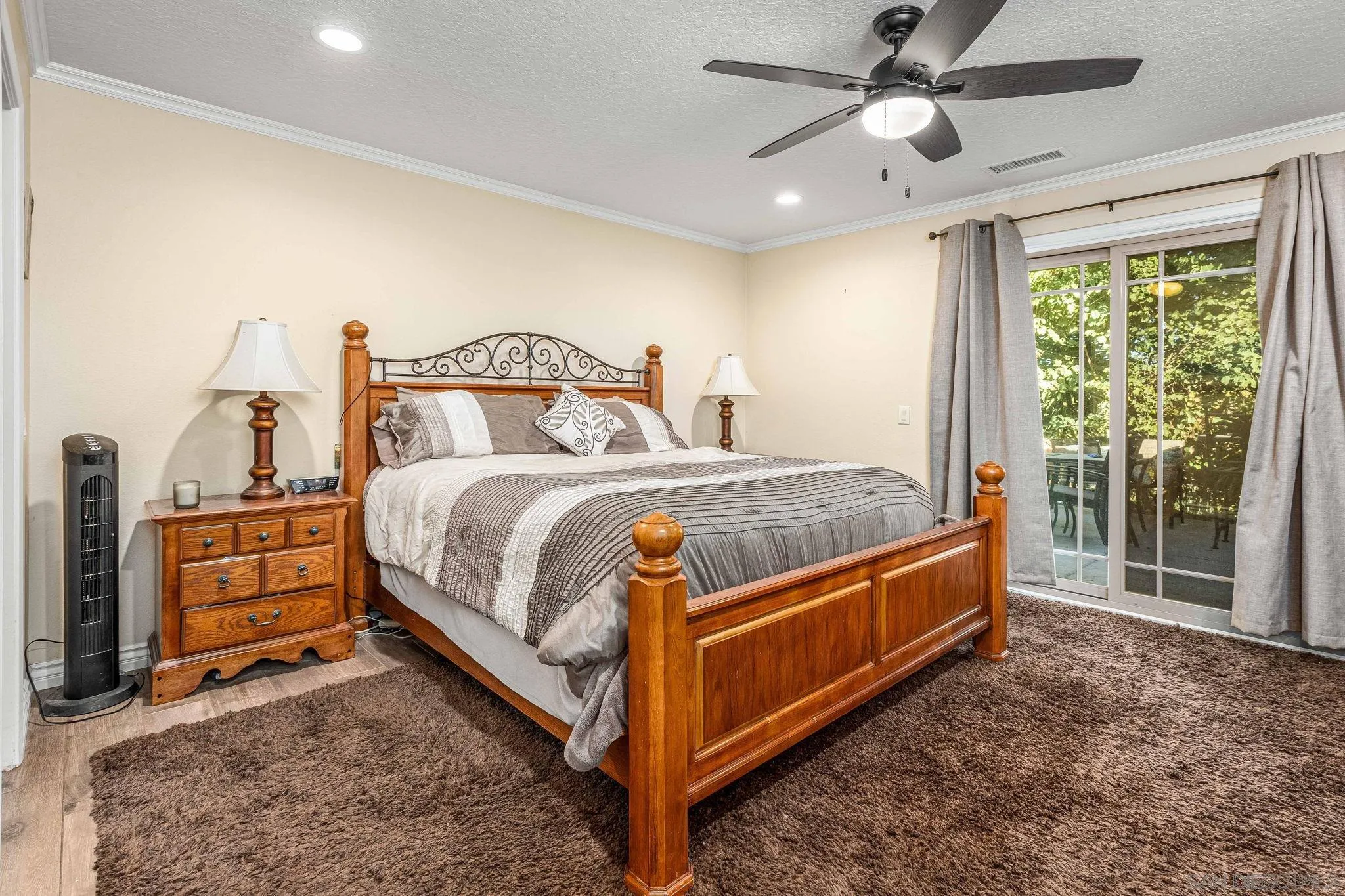 2302 Casitas Del Sol Fallbrook, CA 92028 - Photo 17 of 46 a bed sitting in a room next to a window