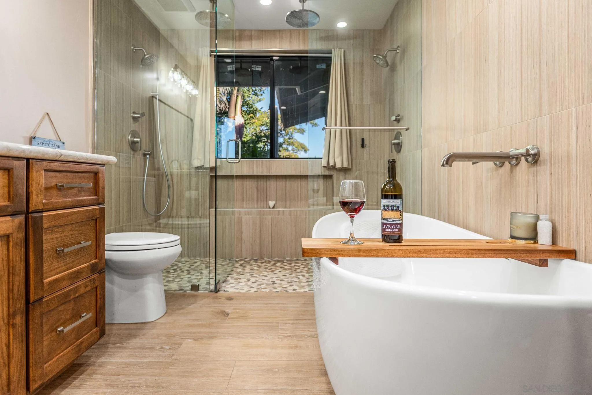 2302 Casitas Del Sol Fallbrook, CA 92028 - Photo 23 of 46 a bathroom with a sink a toilet and shower