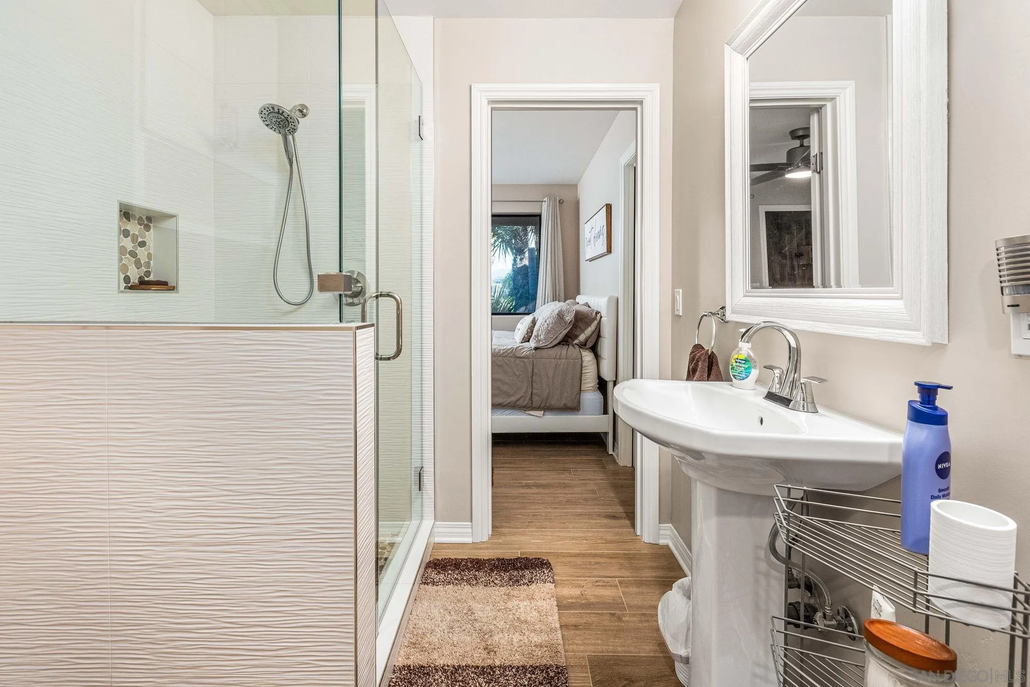 2302 Casitas Del Sol Fallbrook, CA 92028 - Photo 25 of 46 a bathroom with a sink a toilet and shower
