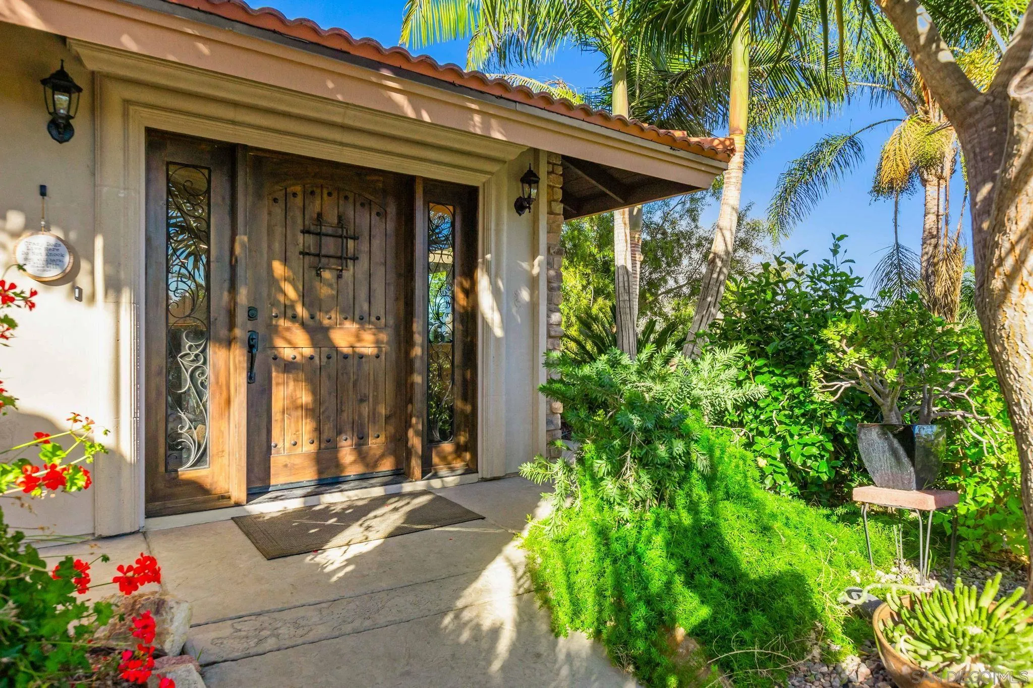 2302 Casitas Del Sol Fallbrook, CA 92028 - Photo 30 of 46 a view of a house with potted plants
