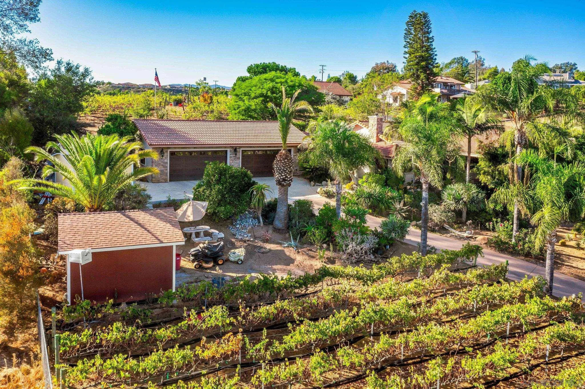 2302 Casitas Del Sol Fallbrook, CA 92028 - Photo 38 of 46 a view of a house with a yard and sitting area