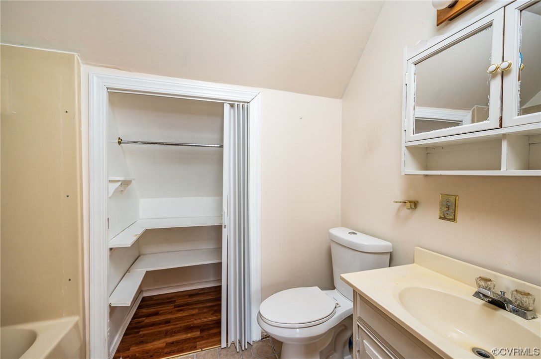 11711 Deerhurst Drive Midlothian, VA 23113 - Photo 19 of 33 a white toilet sitting next to a bathroom sink