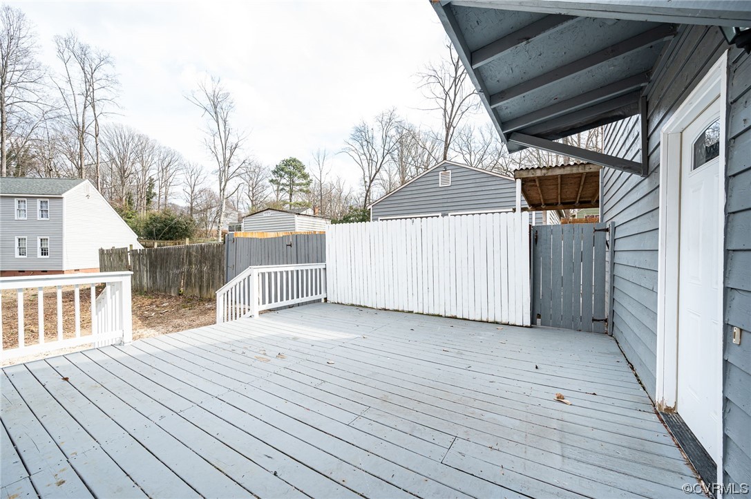 11711 Deerhurst Drive Midlothian, VA 23113 - Photo 3 of 33 a view of a house with wooden deck