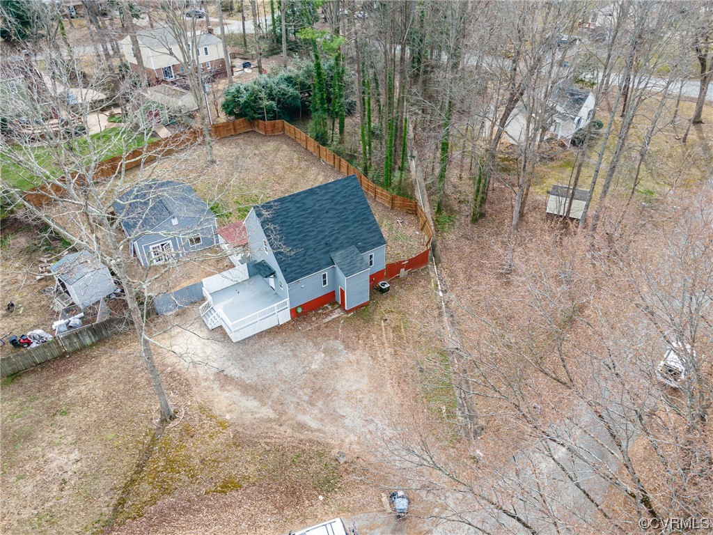 11711 Deerhurst Drive Midlothian, VA 23113 - Photo 33 of 33 a backyard of a house with table and chairs
