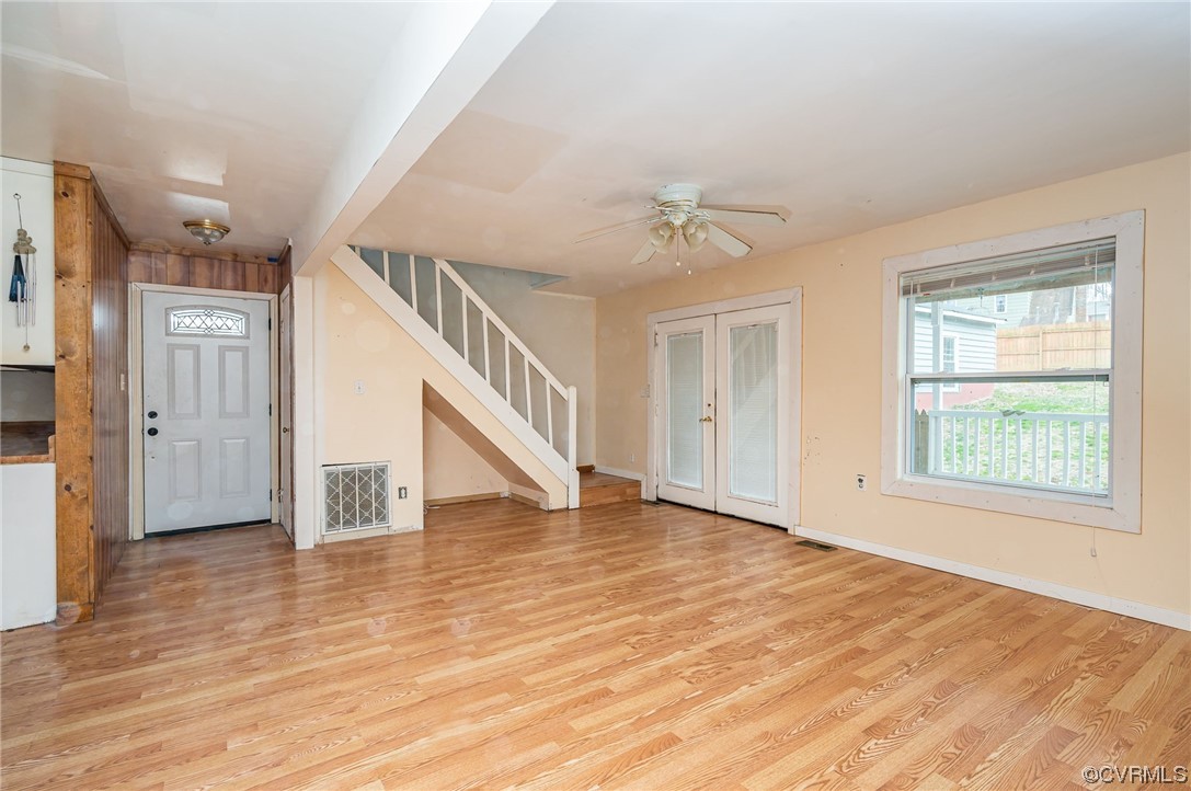 11711 Deerhurst Drive Midlothian, VA 23113 - Photo 8 of 33 a view of an empty room with wooden floor and a window