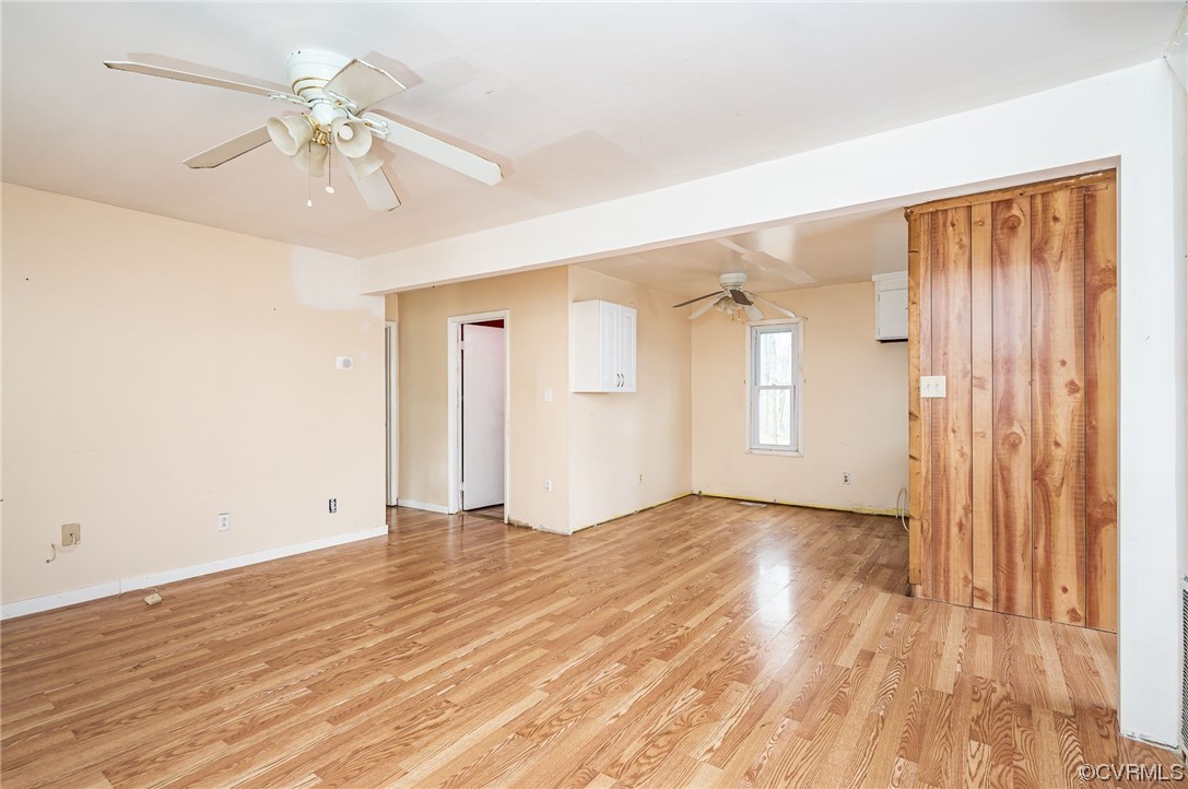 11711 Deerhurst Drive Midlothian, VA 23113 - Photo 9 of 33 wooden floor in an empty room with a window