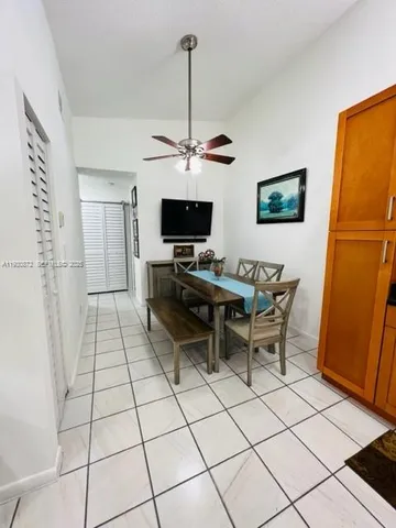 a view of a workspace with furniture