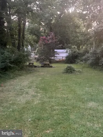 a view of outdoor space and yard