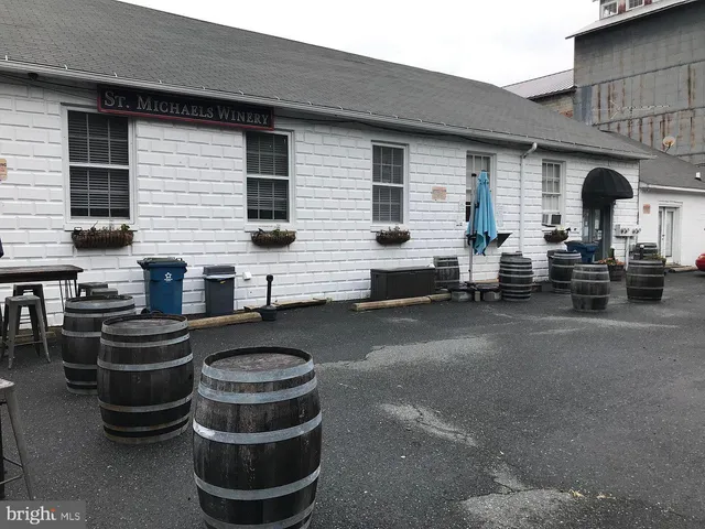 a couple of chairs in front of house