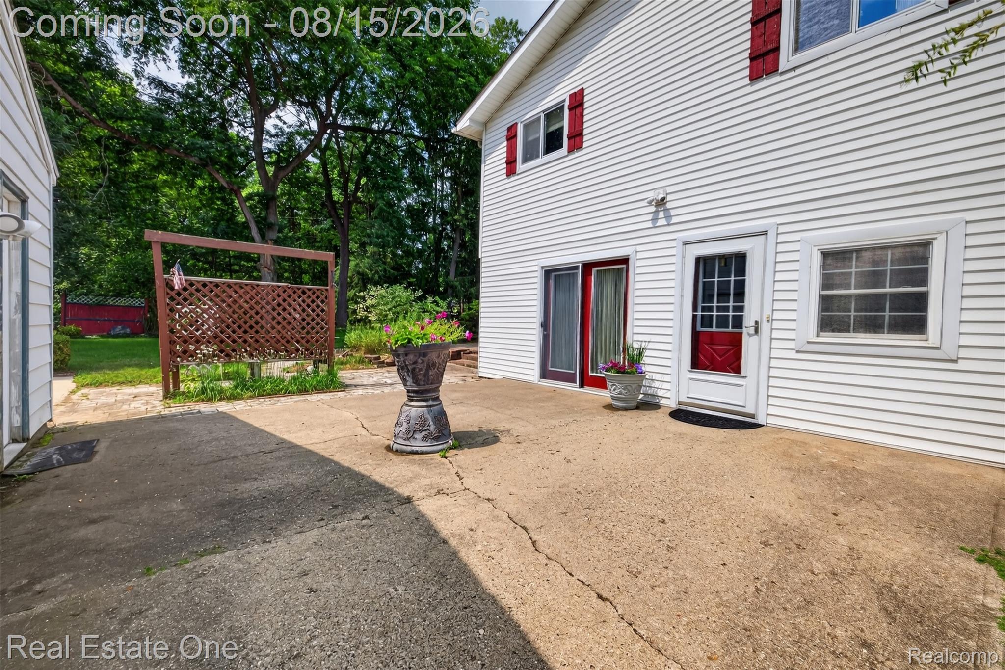 454 South Baldwin Road Oxford, MI 48371 - Photo 39 of 64 48) Patio between house & garage.jpg