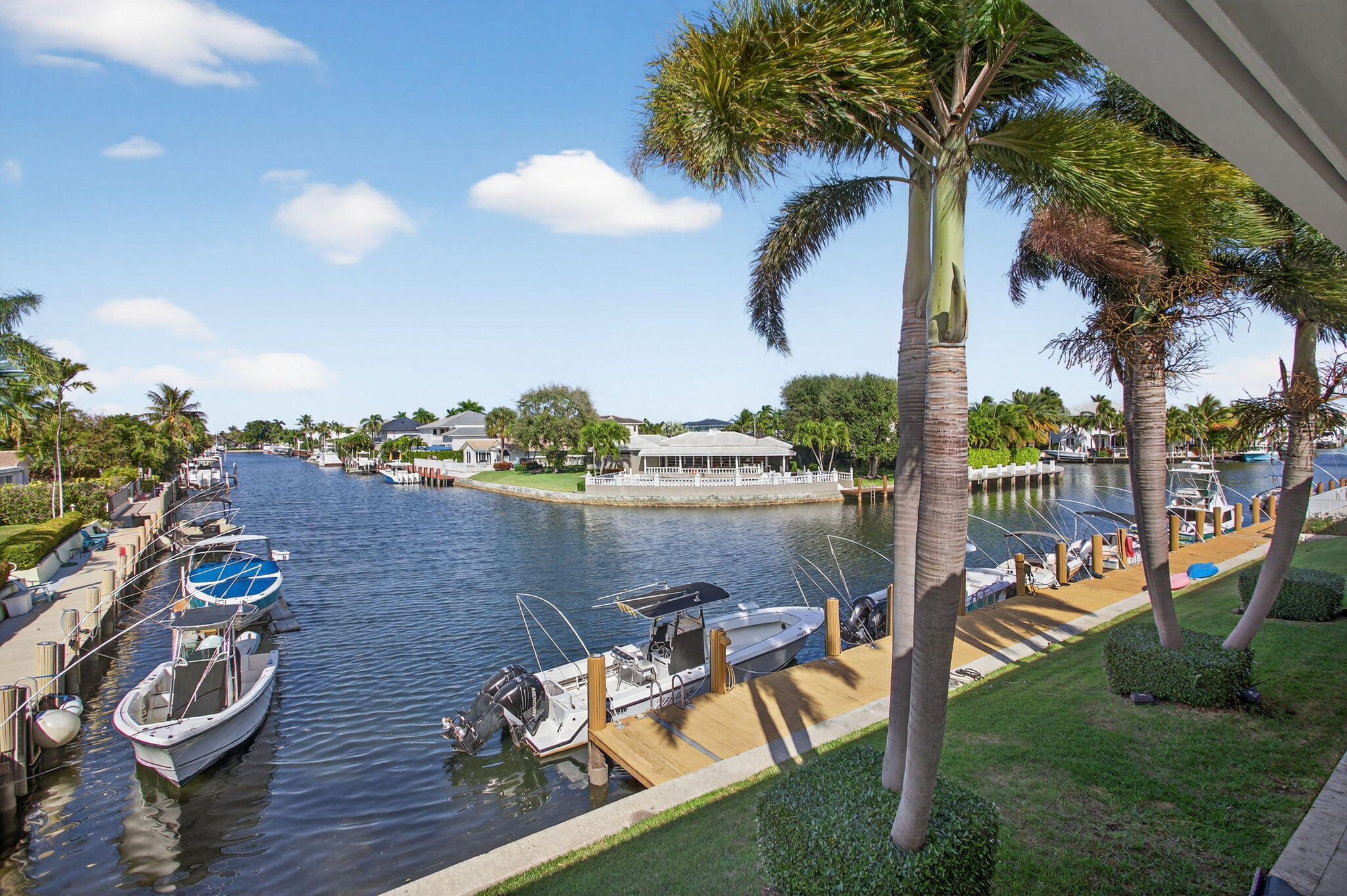 a view of a lake from a balcony with outdoor space