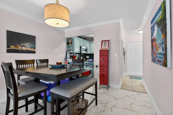 a view of a dining room with furniture