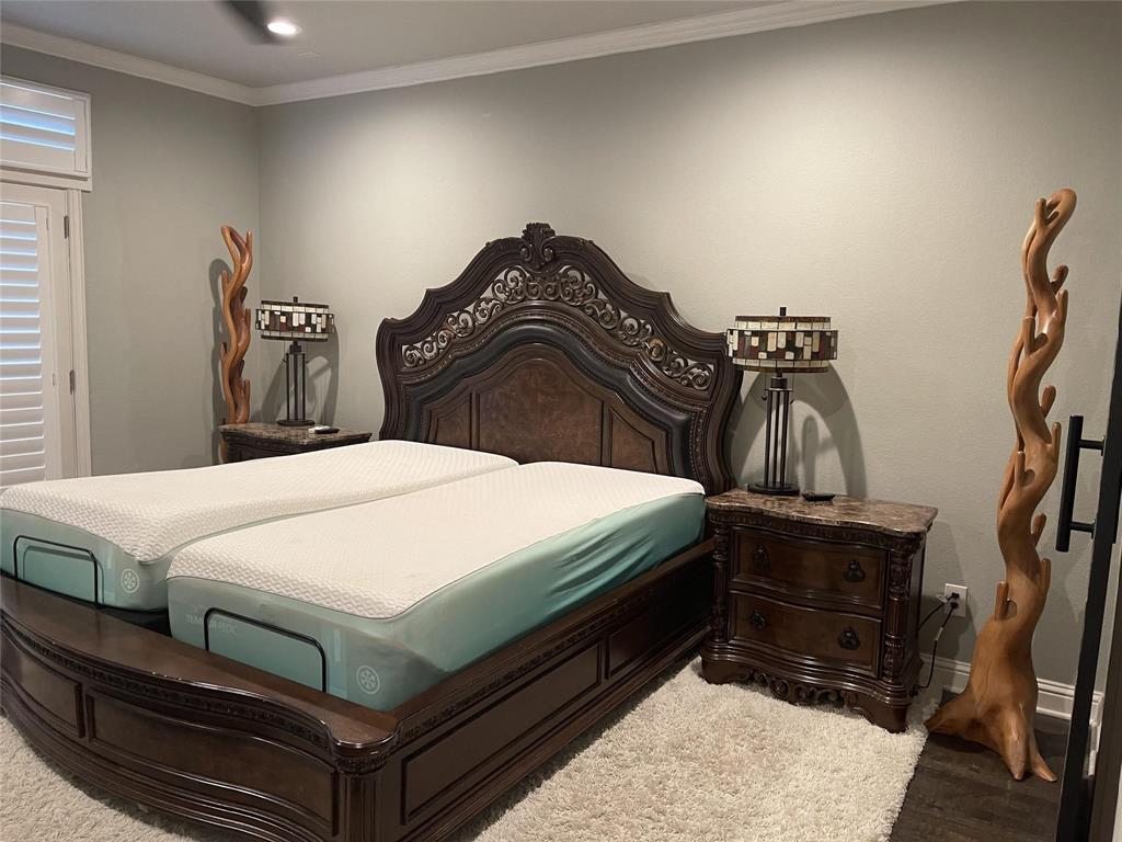 5724 Tupelo Drive Plano, TX 75024 - Photo 8 of 14 a bedroom with a bed and a dresser