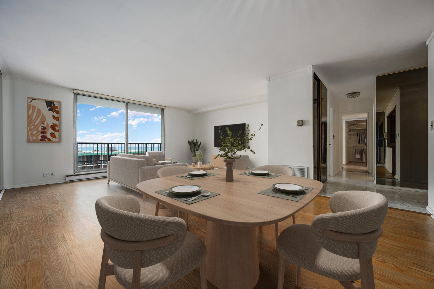 5855 North Sheridan Road, Unit 17D Chicago, IL 60660 - Photo 3 of 18 a view of a dining room with furniture and wooden floor