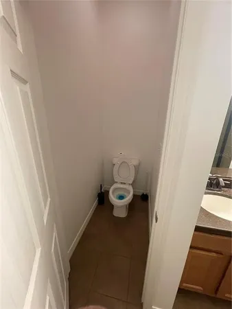 a bathroom with a sink and a toilet