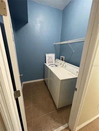 a utility room with washer and dryer