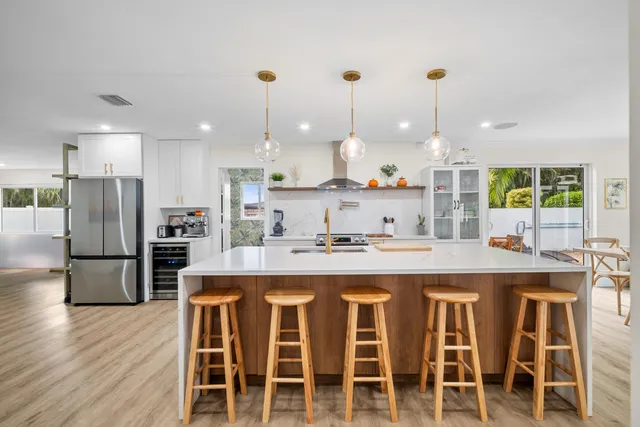 a view of a dining area with furniture window and wooden floor