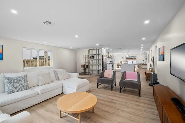 a bathroom with a sink a toilet and bathtub