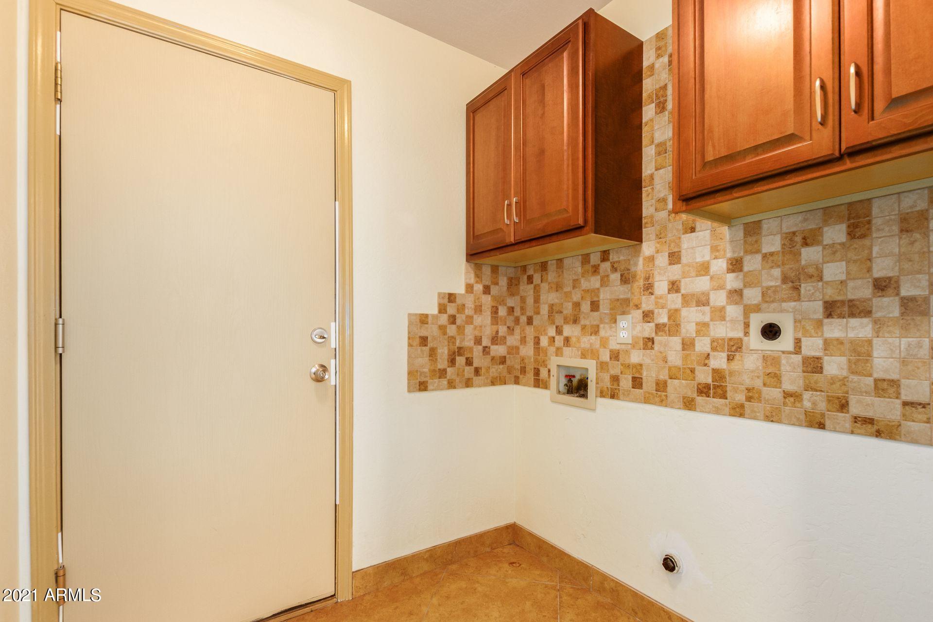 1631 East Vineyard Road Phoenix, AZ 85042 - Photo 26 of 32 INSIDE LAUNDRY ROOM
