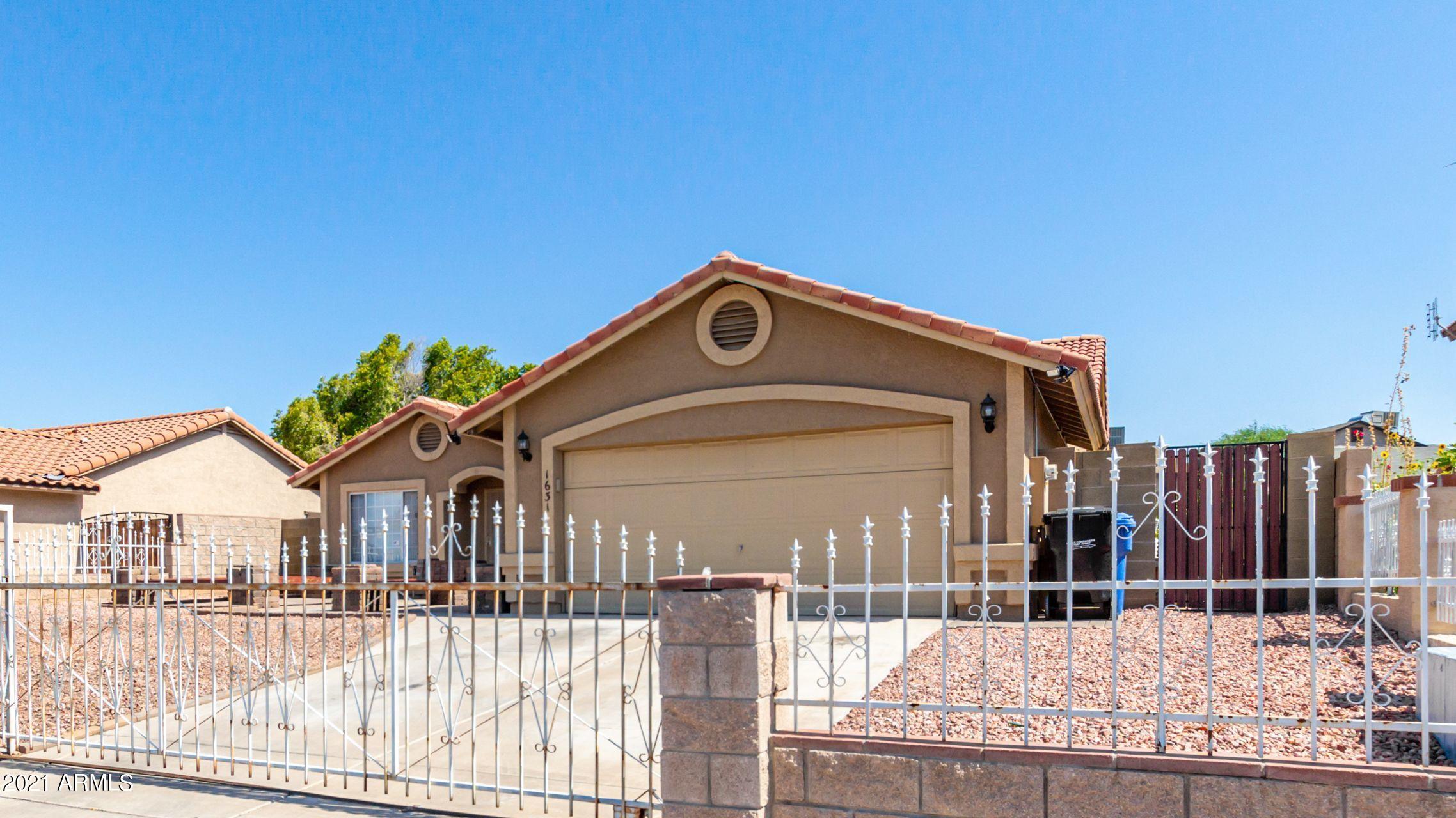 1631 East Vineyard Road Phoenix, AZ 85042 - Photo 3 of 32 A5CZRrfA