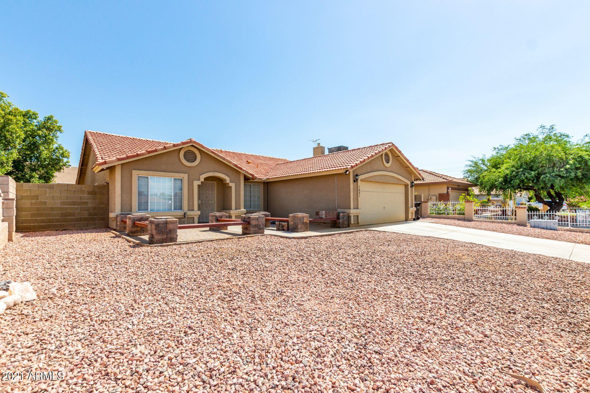 1631 East Vineyard Road Phoenix, AZ 85042 - Photo 4 of 32 BfqTOsFA