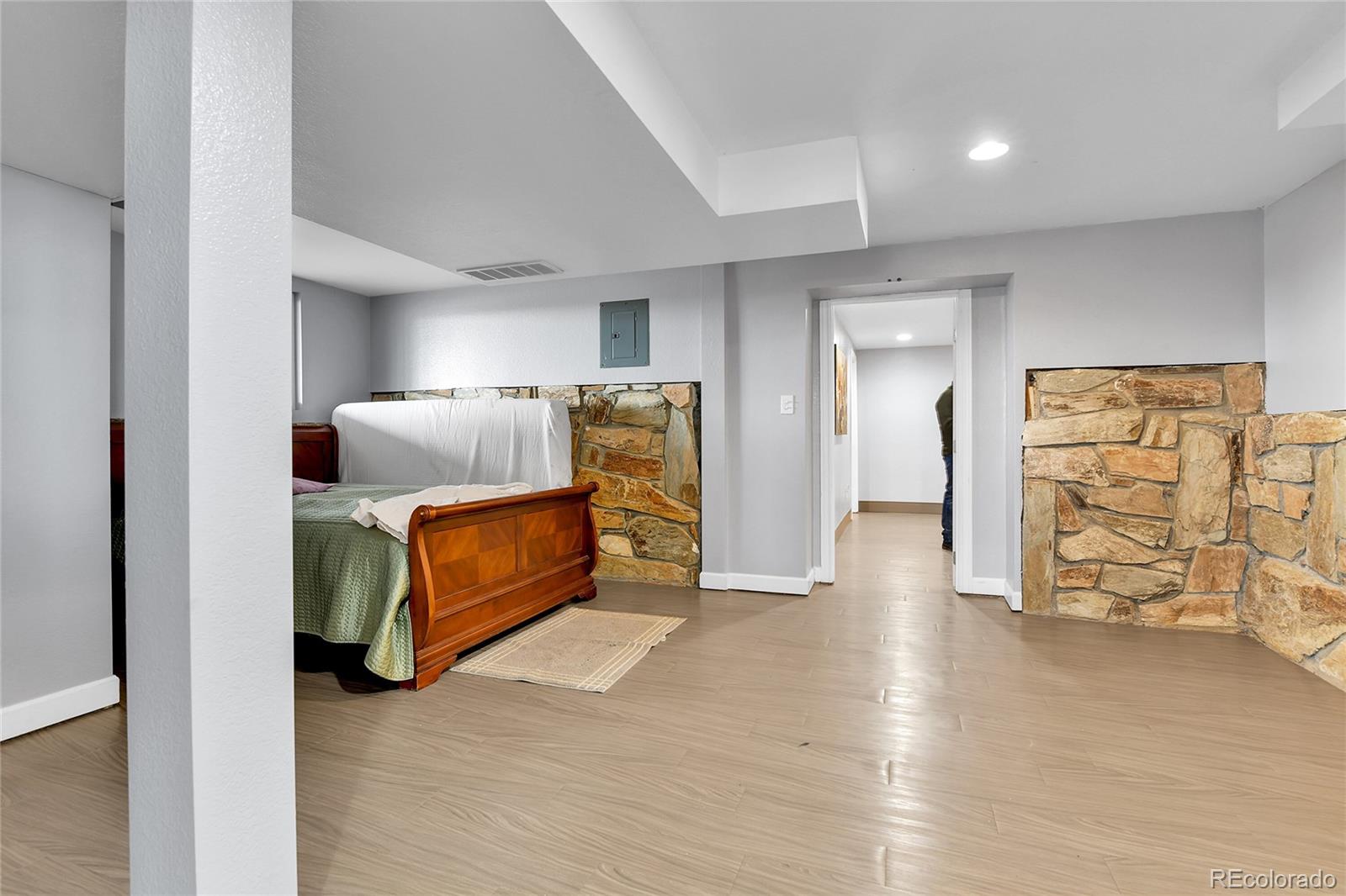 1632 Kiowa-Bennett Road Bennett, CO 80102 - Photo 23 of 42 a bedroom with furniture and a dresser