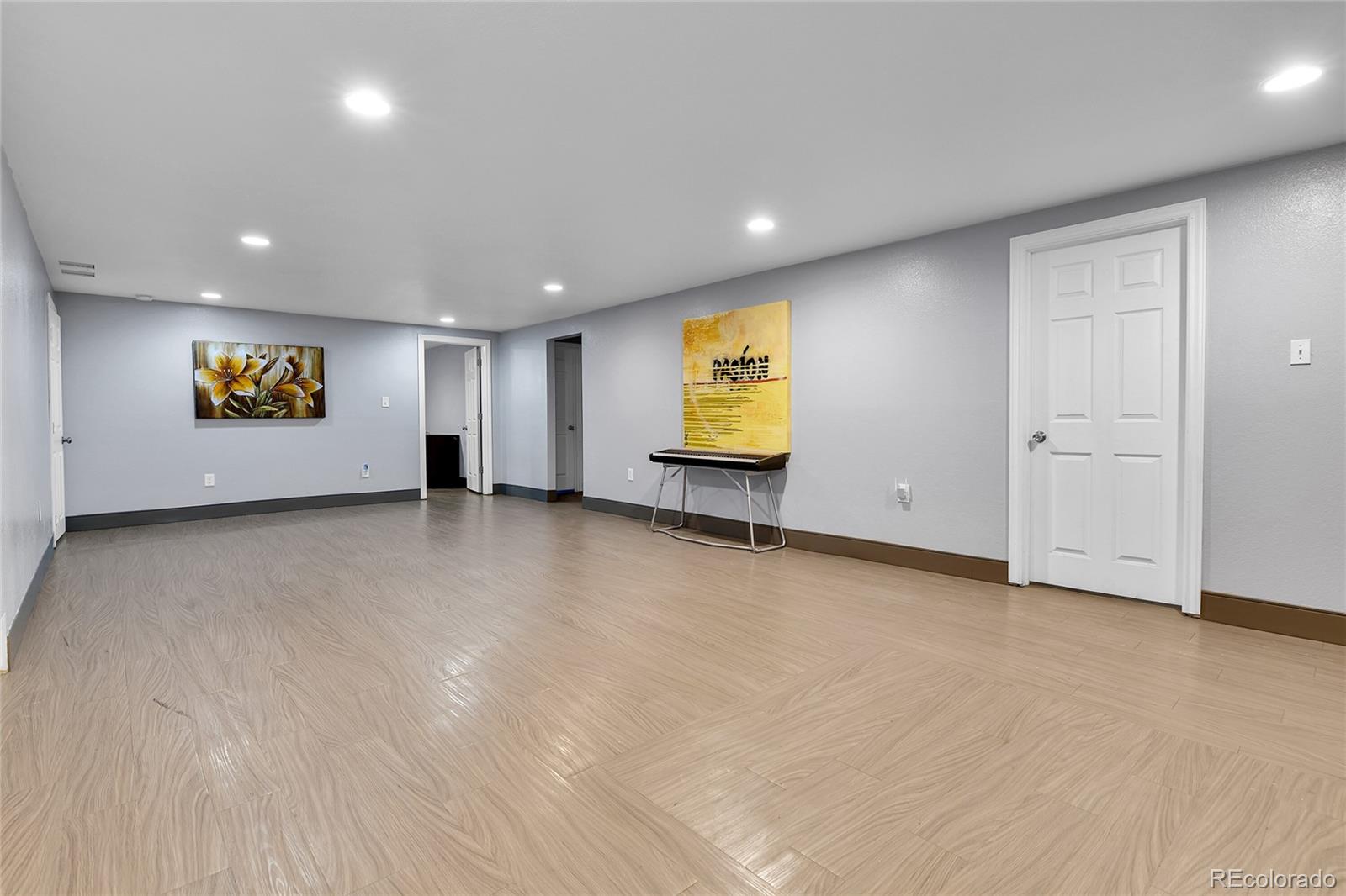 1632 Kiowa-Bennett Road Bennett, CO 80102 - Photo 26 of 42 an empty room with a window and staircase
