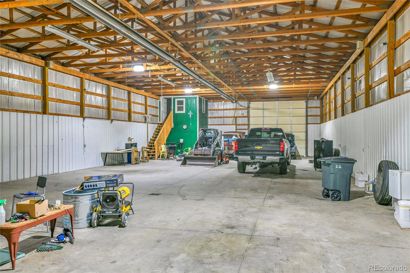 1632 Kiowa-Bennett Road Bennett, CO 80102 - Photo 33 of 42 a view of a garage with sitting area