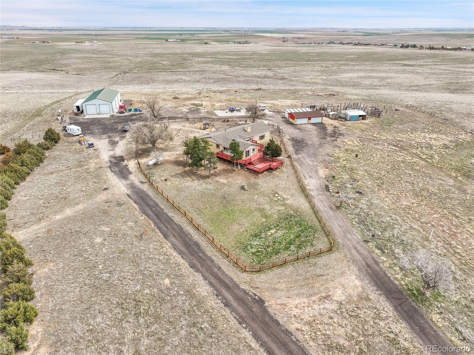 1632 Kiowa-Bennett Road Bennett, CO 80102 - Photo 35 of 42 a view of a city