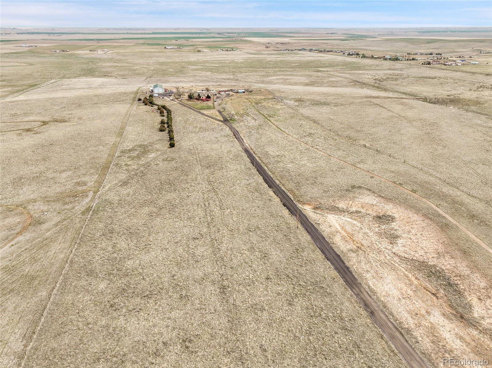 1632 Kiowa-Bennett Road Bennett, CO 80102 - Photo 36 of 42 a view of beach and ocean