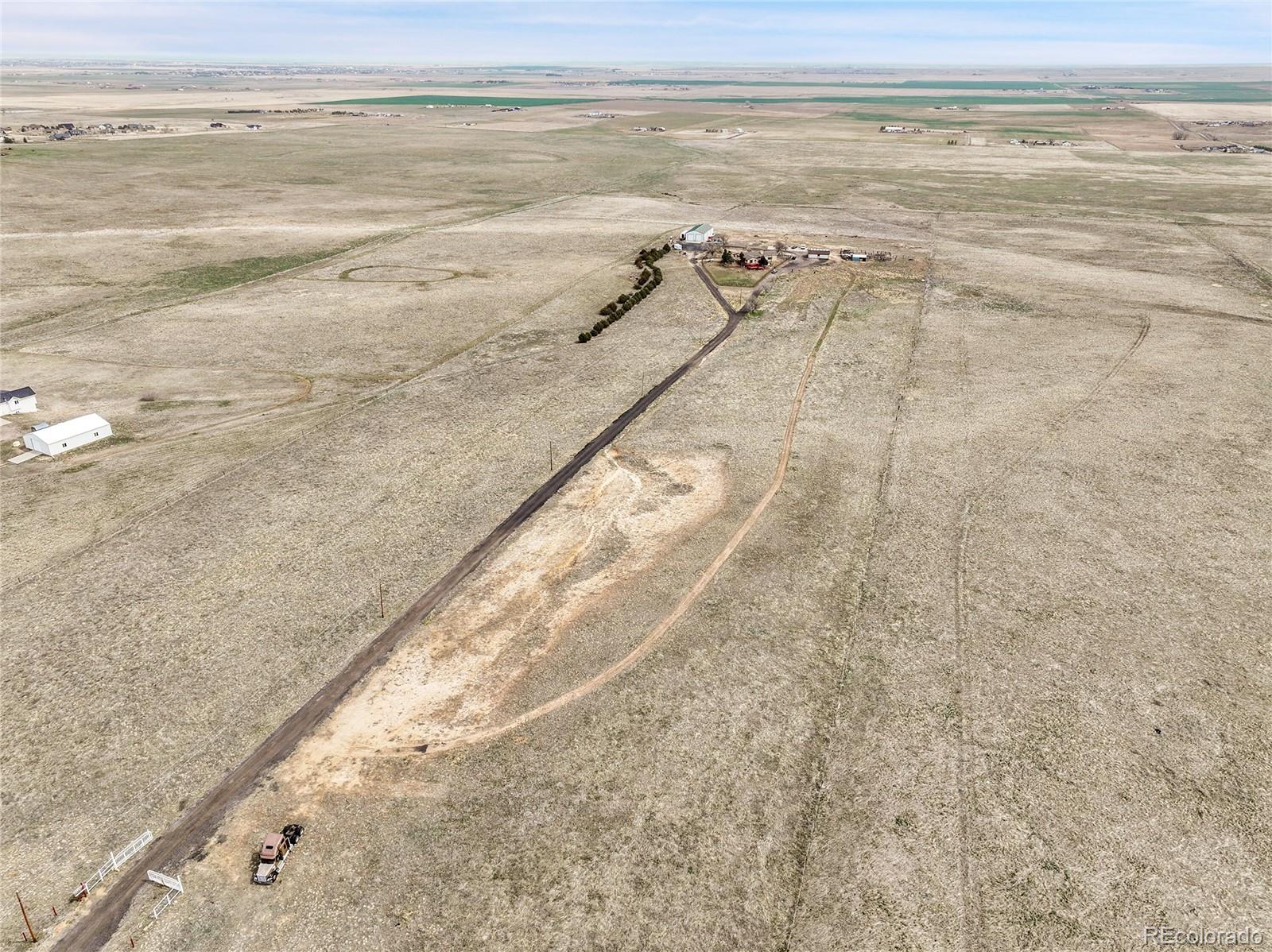 1632 Kiowa-Bennett Road Bennett, CO 80102 - Photo 37 of 42 a view of beach and ocean