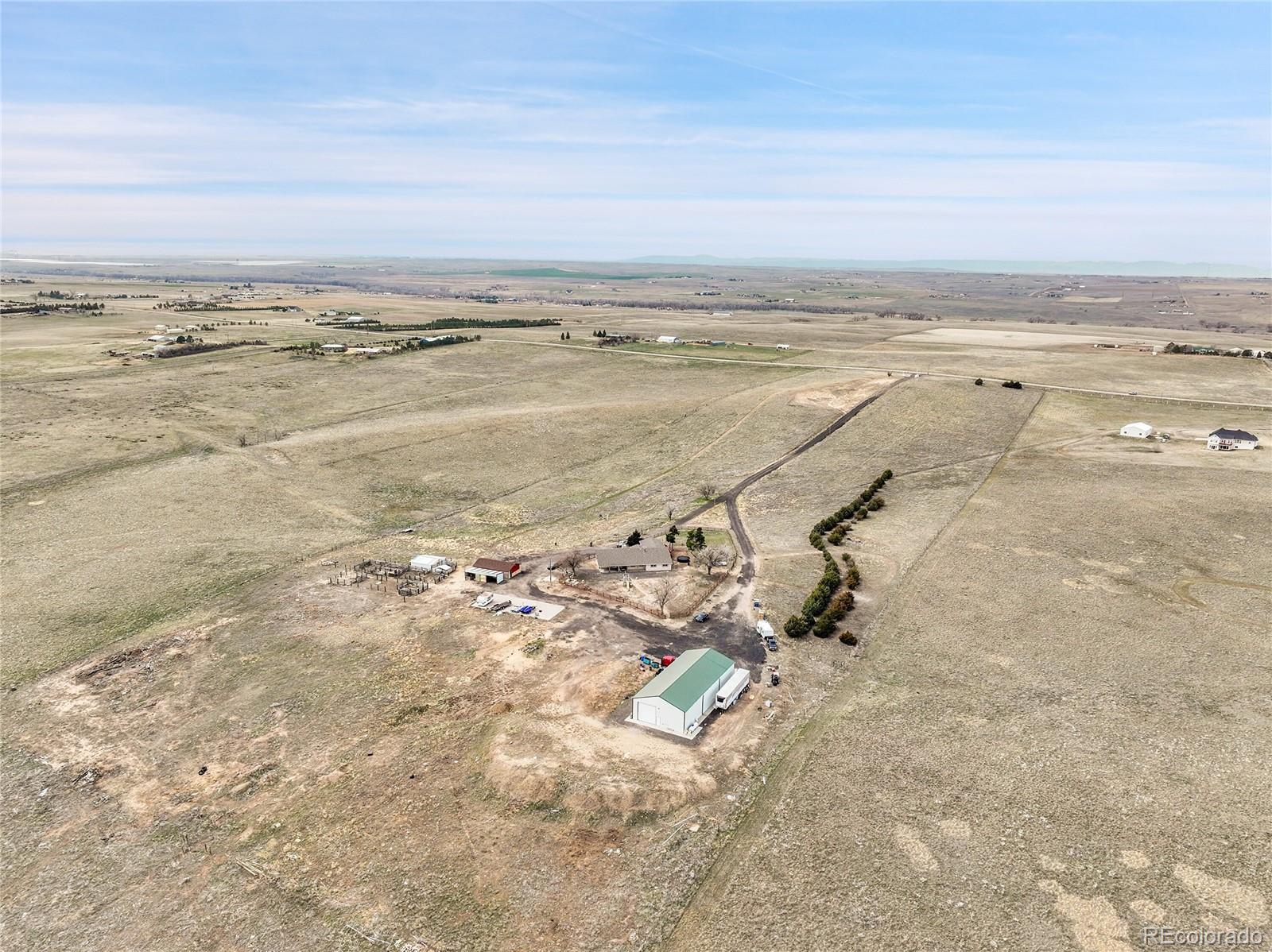 1632 Kiowa-Bennett Road Bennett, CO 80102 - Photo 39 of 42 an aerial view of beach and ocean