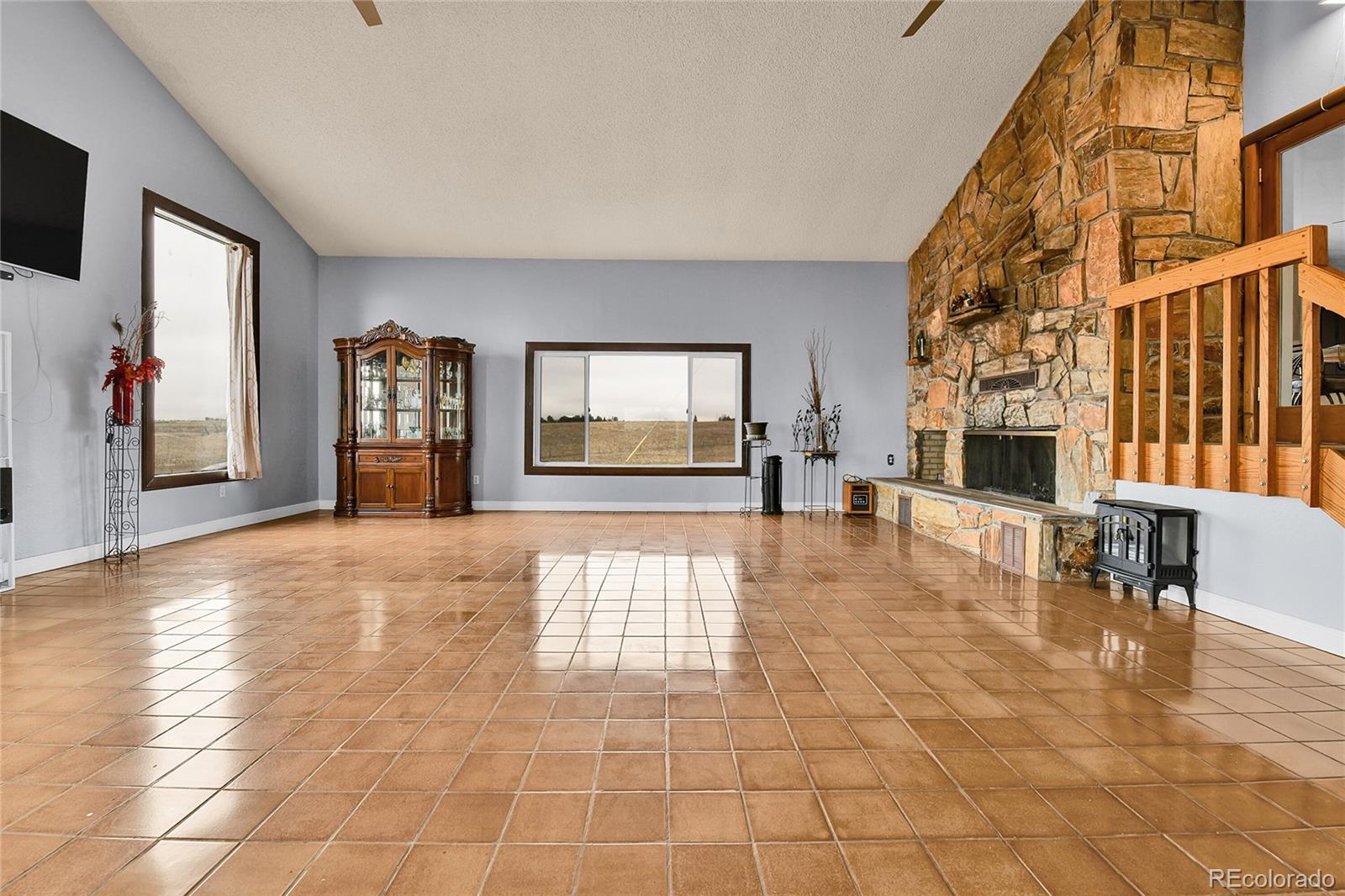 1632 Kiowa-Bennett Road Bennett, CO 80102 - Photo 4 of 42 a view of a livingroom with furniture and an entryway