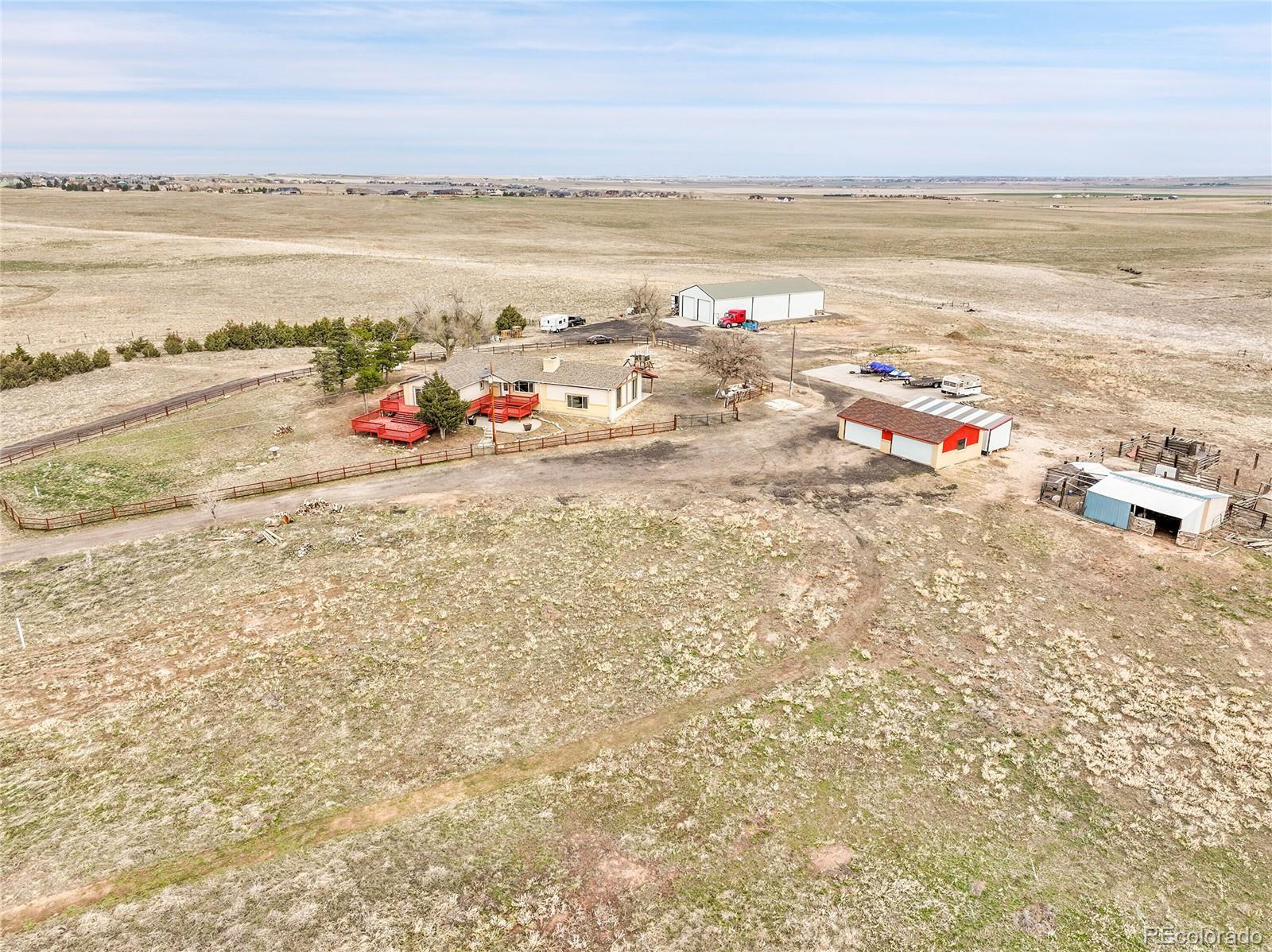 1632 Kiowa-Bennett Road Bennett, CO 80102 - Photo 42 of 42 a view of an ocean and beach