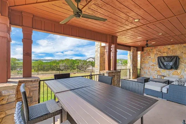 a view of a patio with swimming pool