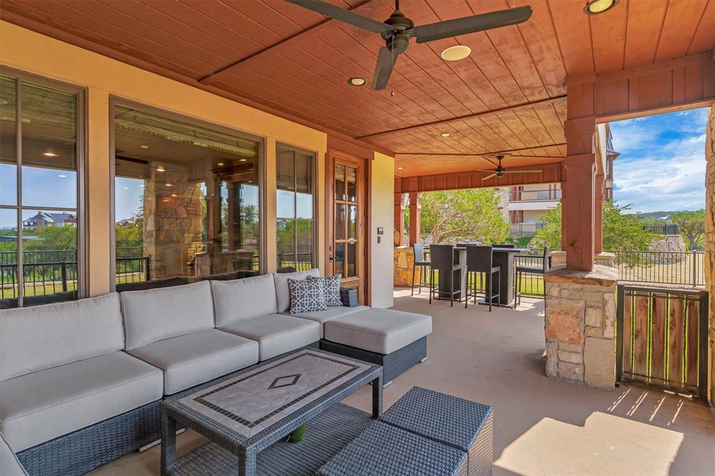 1693 Scenic Drive, Unit 101 Graford, TX 76449 - Photo 28 of 35 a living room with furniture and a large window