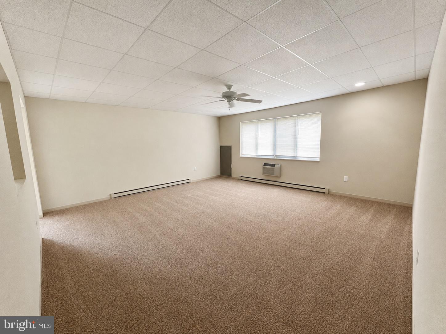860 Lower Ferry Road, Unit 1L Ewing, NJ 08628 - Photo 6 of 23 Bright, versatile living room