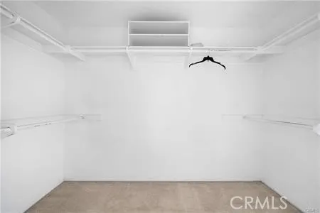 a view of small space with racks on the wall