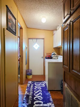 a bathroom with a toilet a sink and a mirror