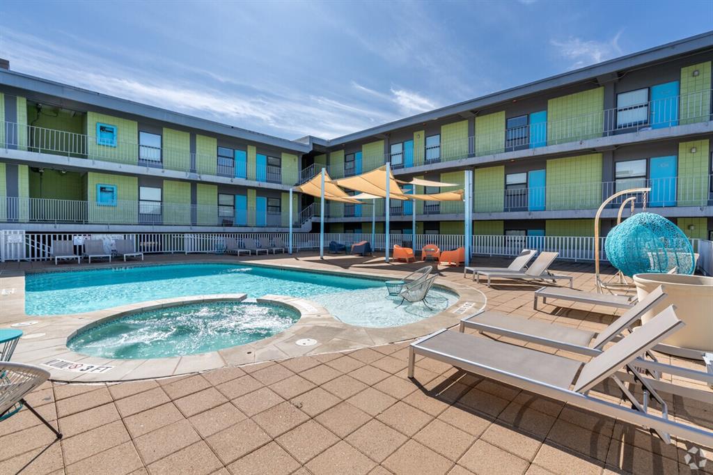 2408 Leon Street, Unit 306 Austin, TX 78705 - Photo 2 of 7 a view of pool with outdoor seating