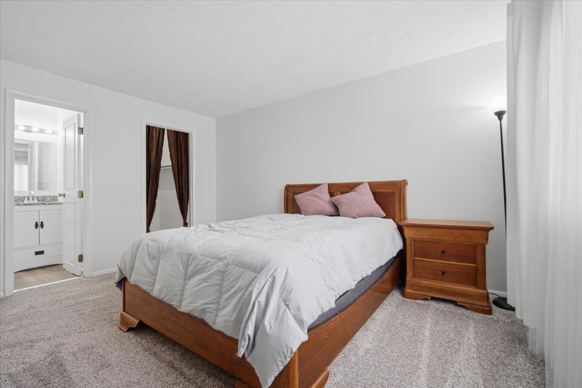 1600 Northbrook Drive, Unit B9 Normal, IL 61761 - Photo 15 of 24 a bedroom with a bed and closet