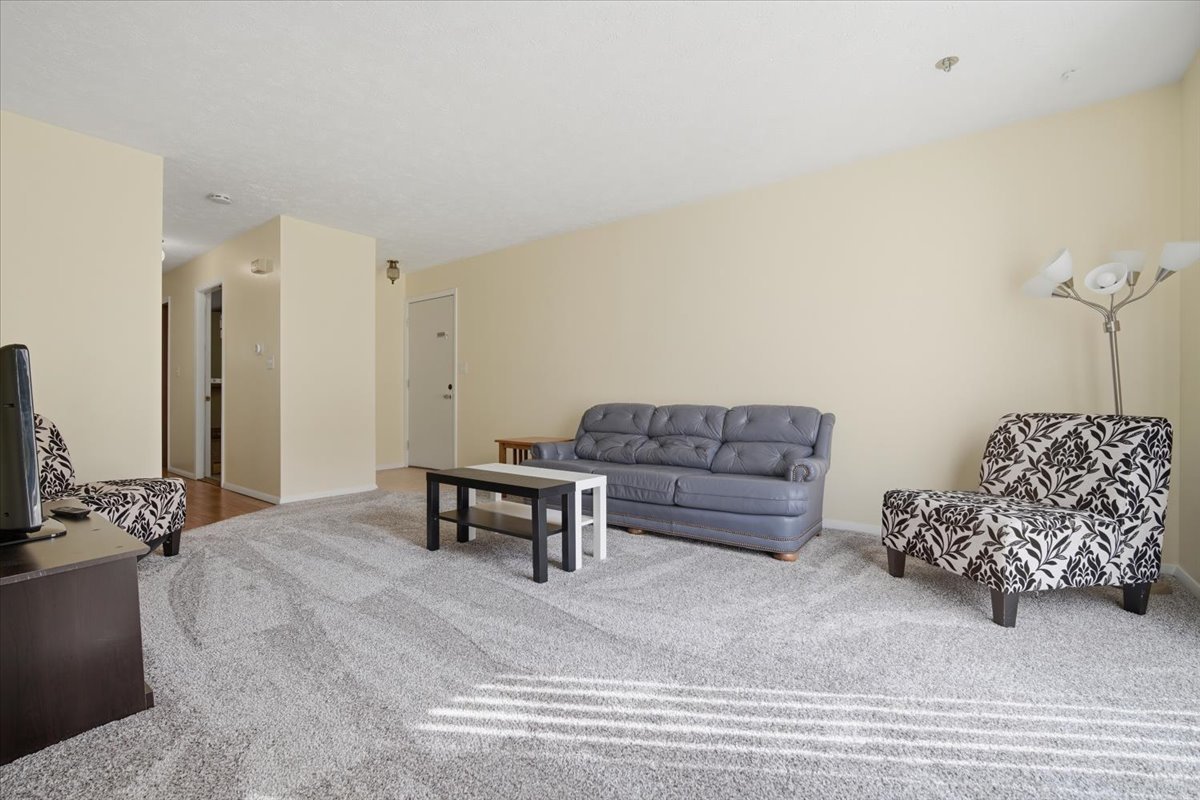 1600 Northbrook Drive, Unit B9 Normal, IL 61761 - Photo 6 of 24 a living room with furniture