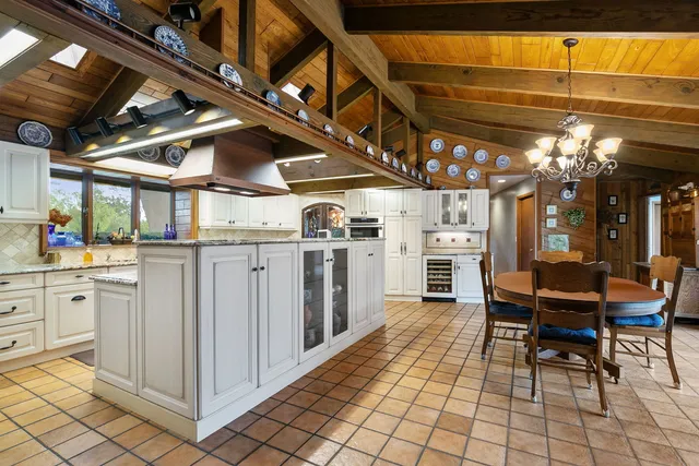 a view of a chairs and table in a patio