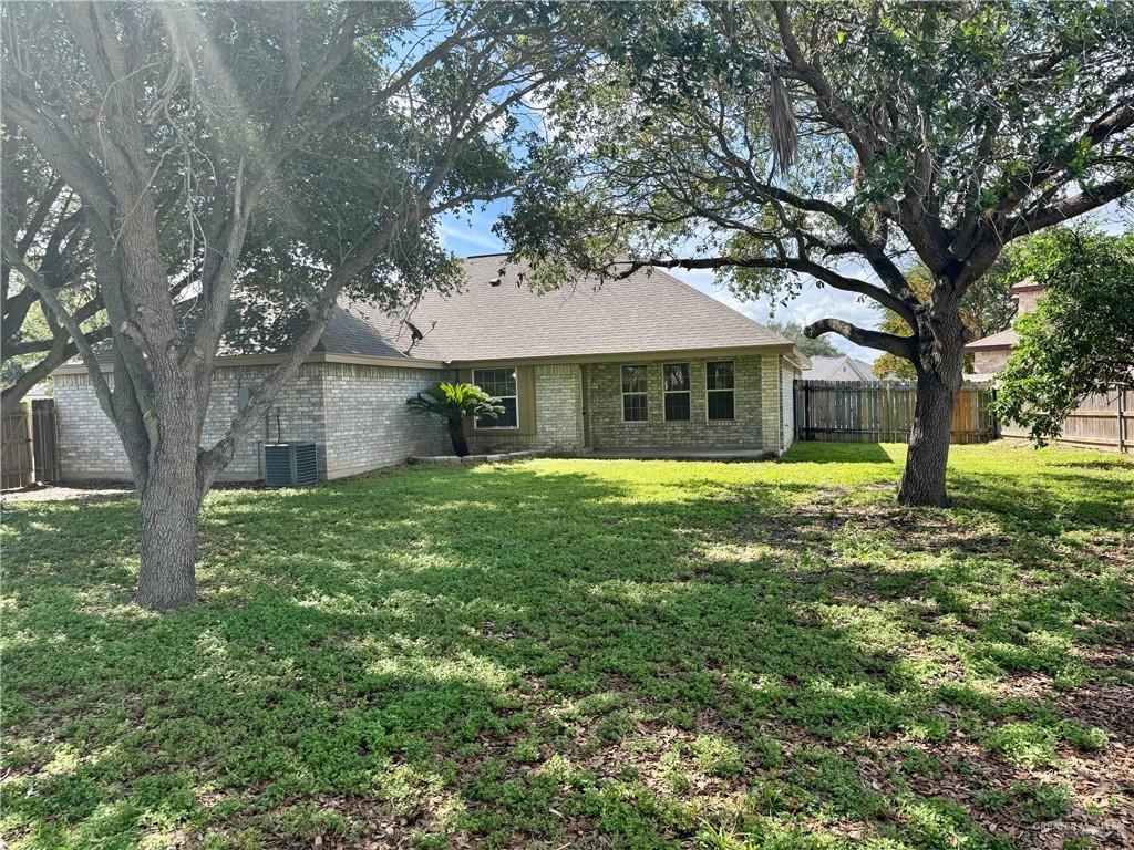2207 Turtle Court Mission, TX 78572 - Photo 20 of 22 a front view of a house with garden