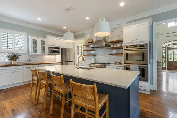 a bed room with a bed and a tv